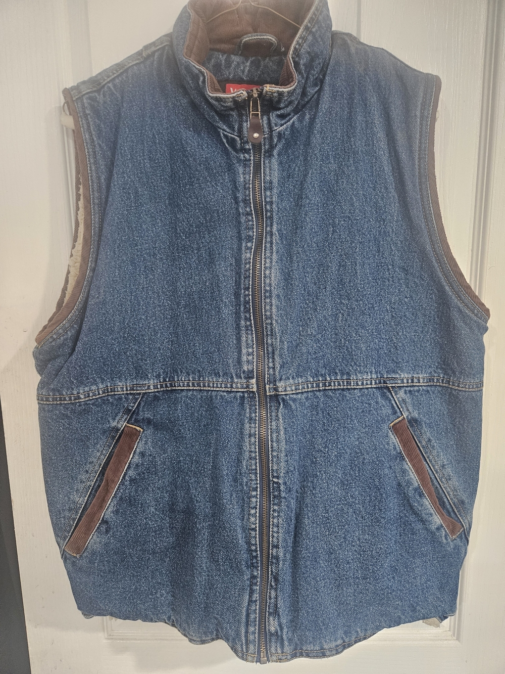 Wrangler blue denim jacket with brown collar and cream sherpa lining